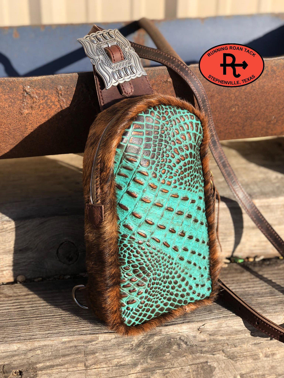 Cibolo Cross Body Slingbag in Turquoise Croc with Metallic Copper Tips
