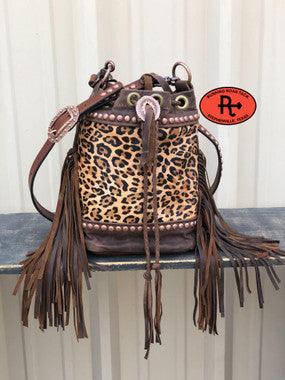 Sphynx leather and deals hair on handbag